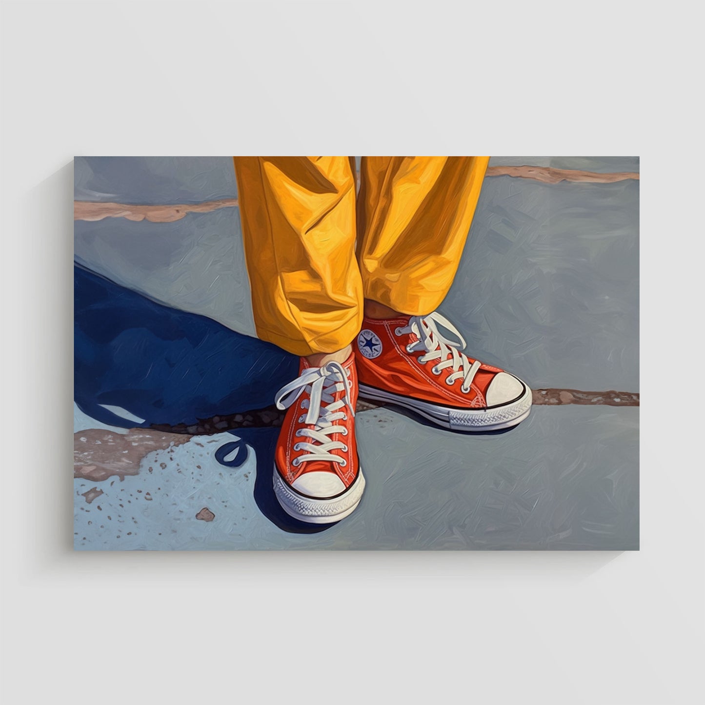 Imagen de un par de zapatillas Converse rojas con cordones blancos, combinadas con pantalones amarillos brillantes. La foto destaca el contraste de colores vibrantes en una pose casual sobre un fondo de asfalto.