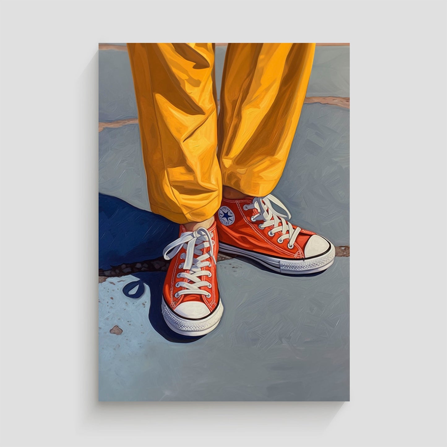 Imagen de un par de zapatillas Converse rojas con cordones blancos, combinadas con pantalones amarillos brillantes. La foto destaca el contraste de colores vibrantes en una pose casual sobre un fondo de asfalto.