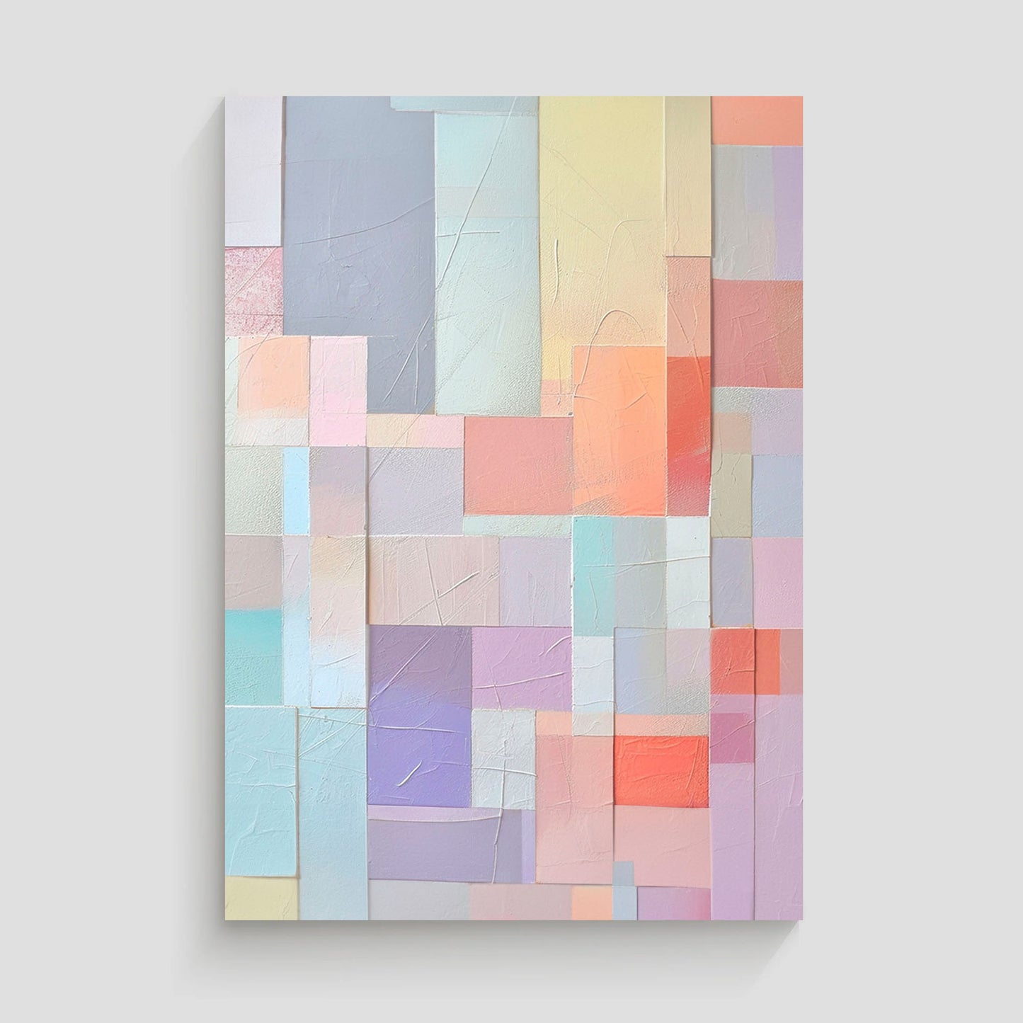 Imagen abstracta con un patrón de bloques geométricos en tonos pastel suaves, incluyendo rosa, lila, azul y coral, dispuestos en un diseño texturizado. Ideal para agregar un toque moderno y sofisticado a la decoración de interiores.