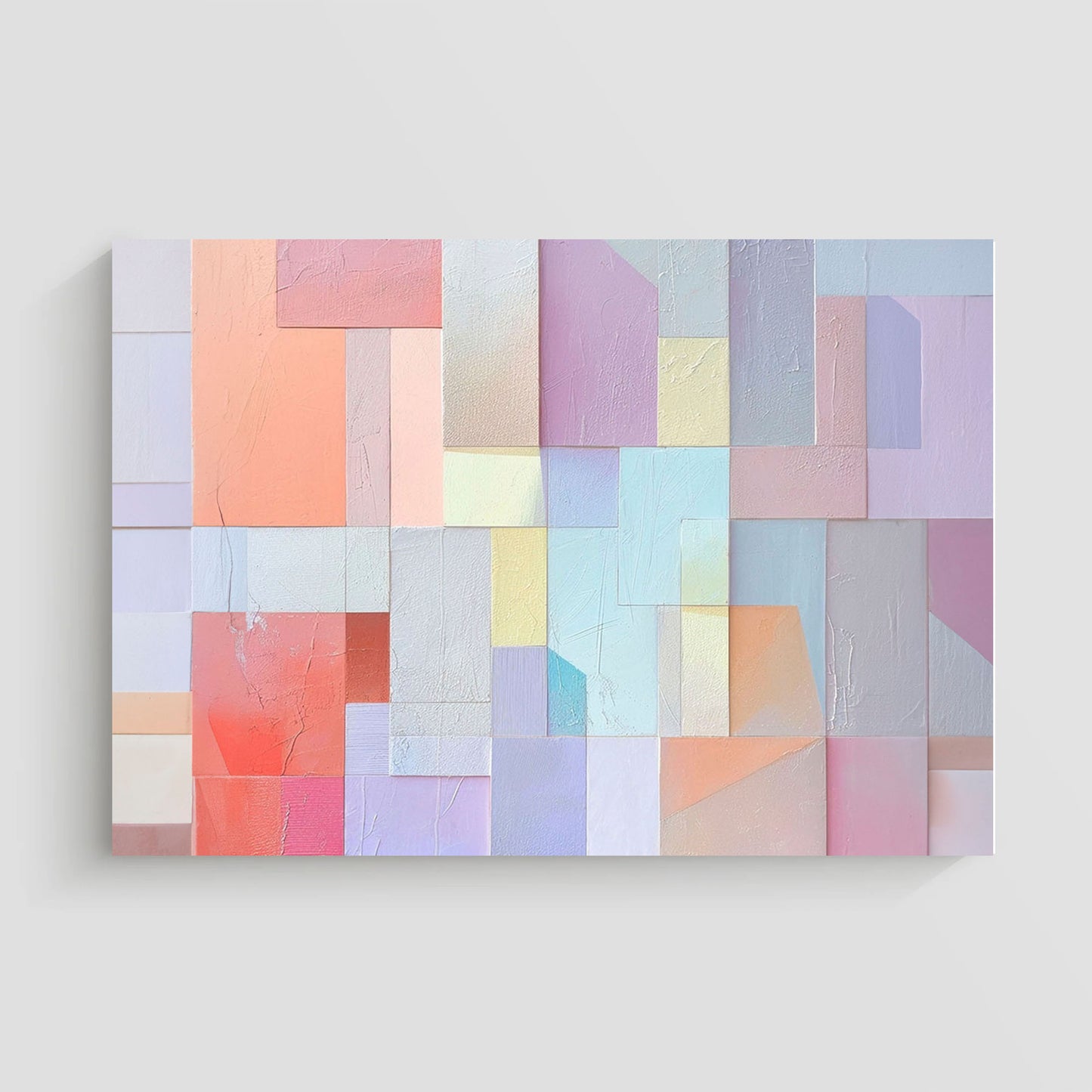 Imagen abstracta con un patrón de bloques geométricos en tonos pastel suaves, incluyendo rosa, lila, azul y coral, dispuestos en un diseño texturizado. Ideal para agregar un toque moderno y sofisticado a la decoración de interiores.